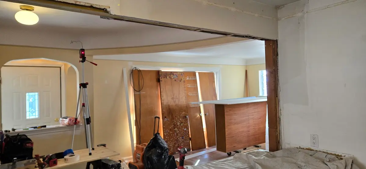 Cracked plaster wall opening before repair in Ecorse MI home