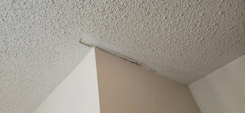 Textured ceiling drywall repair before restoration in Taylor Michigan