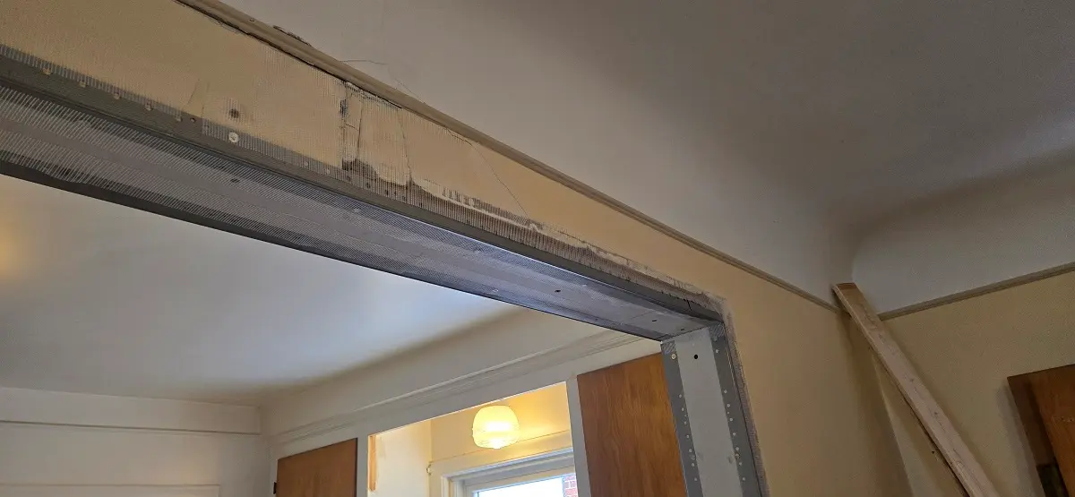 Plaster wall repair during rebuild in Ecorse Michigan