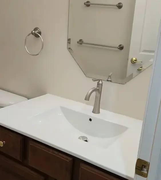 Repaired and smoothed drywall after vanity replacement in a Woodhaven Michigan bathroom