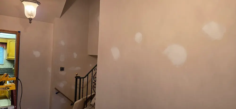 Hallway before painting in Southgate MI showing careful wall preparation