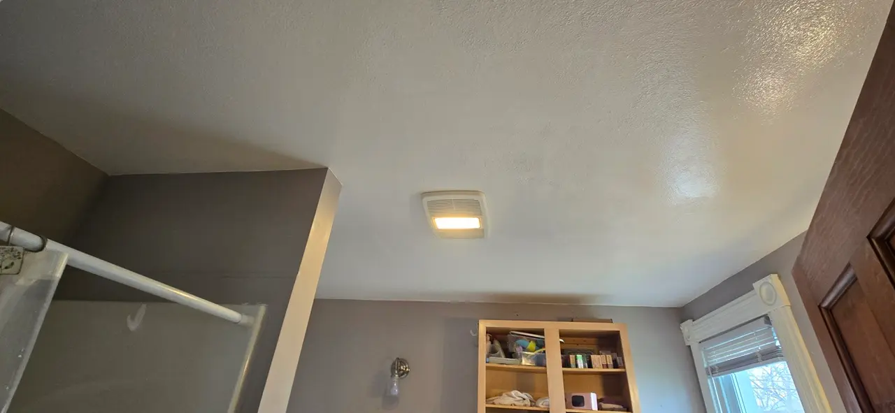 Bathroom ceiling repaint completed in a Flat Rock Michigan home using moisture-resistant interior paint by Five Star Professional Contractors