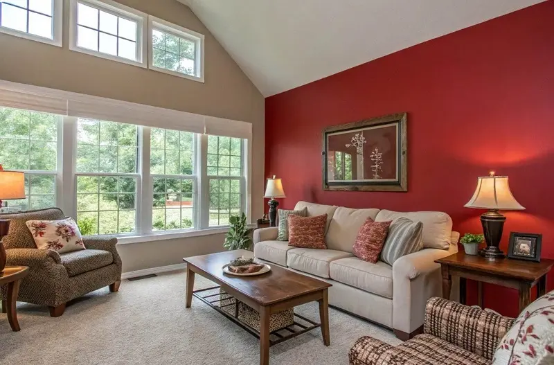 Living room interior painting in Grosse Ile, Michigan featuring a modern accent wall with clean finish lines