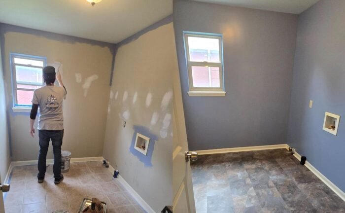 Side-by-side interior painting in Woodhaven, MI showing wall prep for smoothness and final finished room