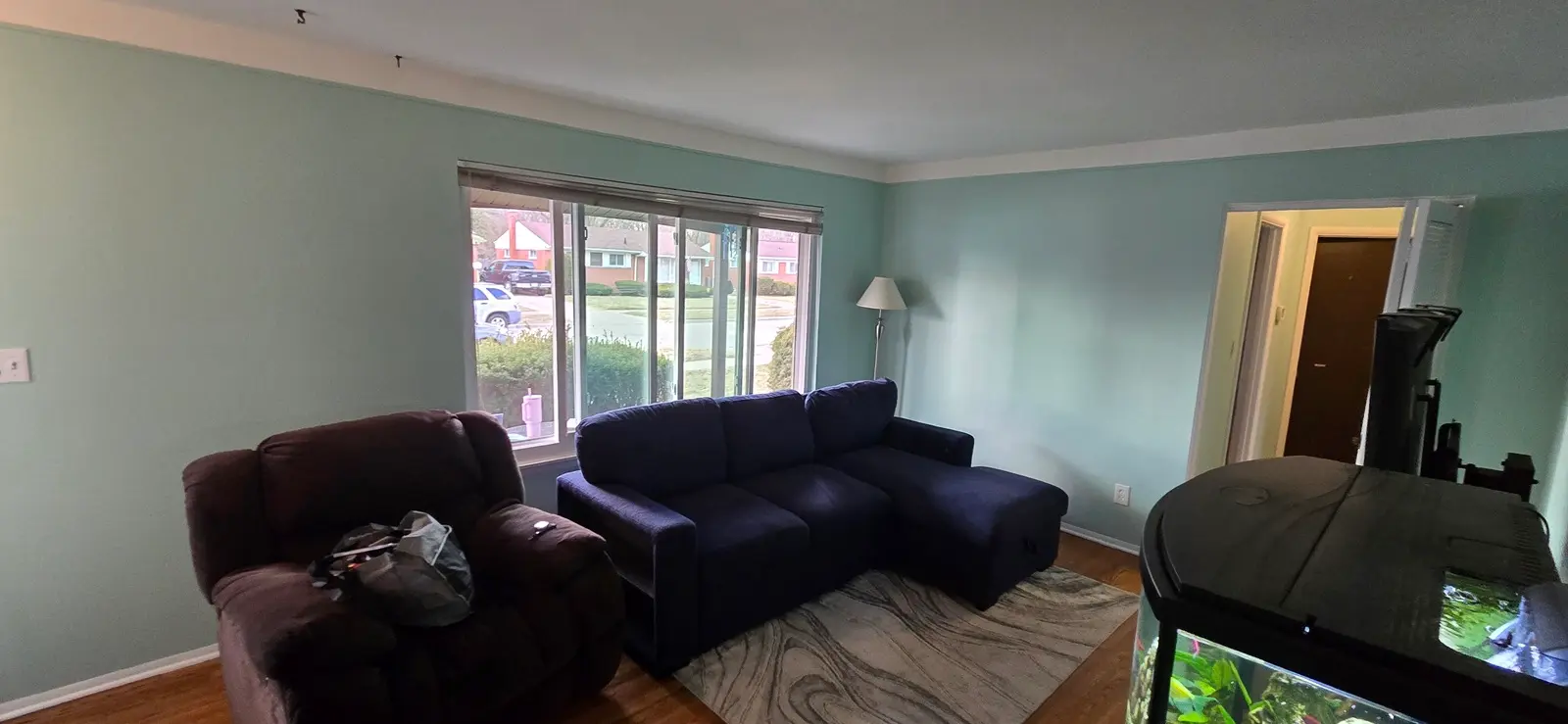 Living room interior painting in Canton Michigan with smooth professional wall finish