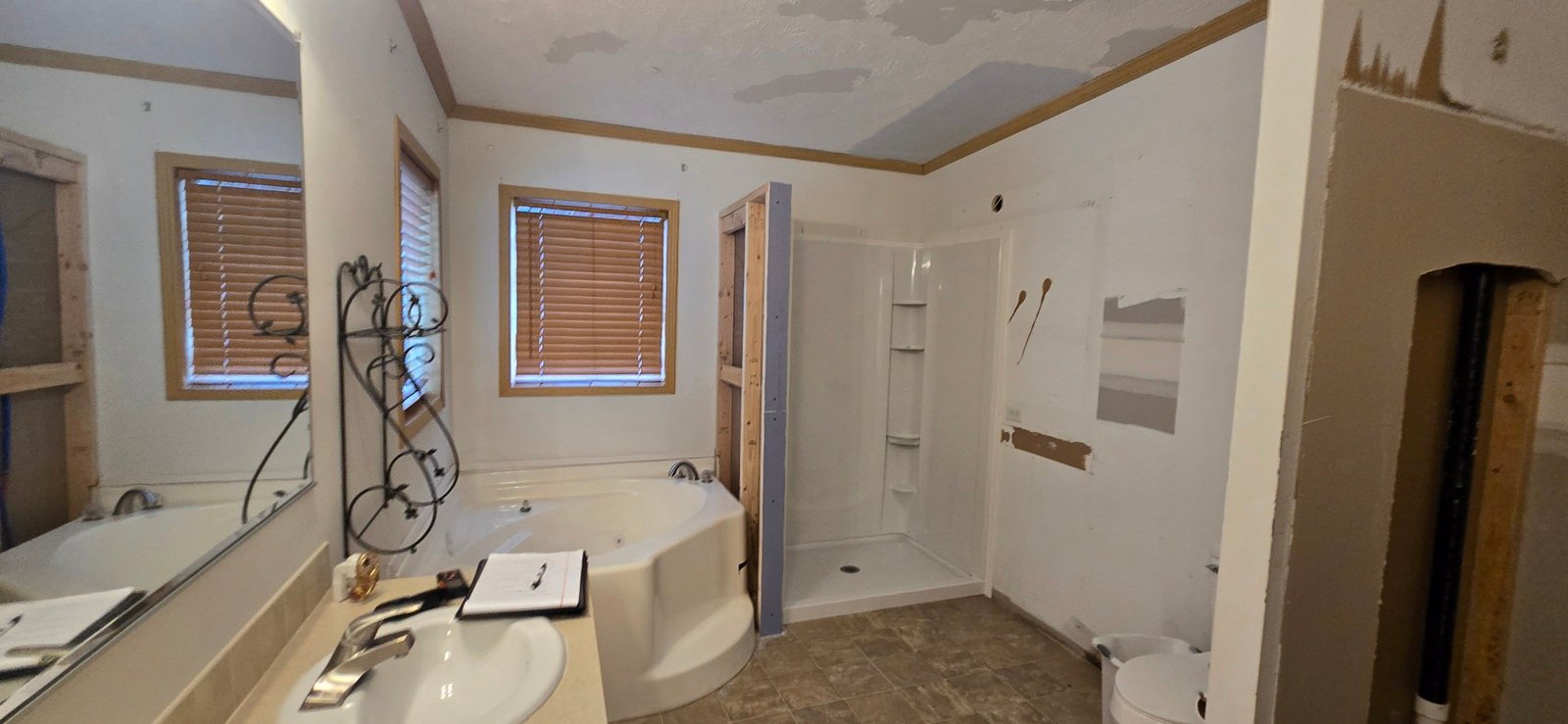 Bathroom drywall and ceiling repairs before finishing in Trenton MI