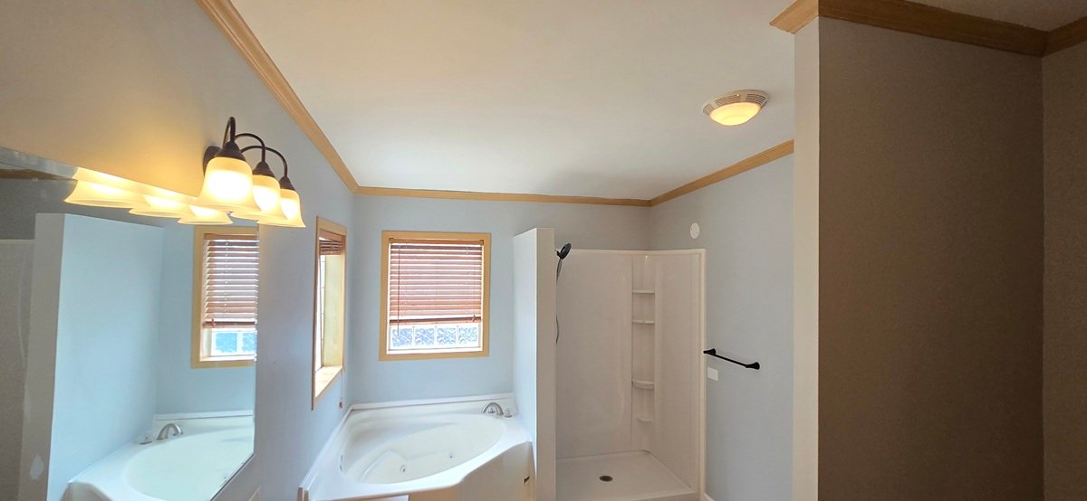 Finished bathroom walls and ceiling after drywall repair in Trenton MI